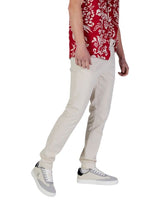 Tommy Jeans · Чино панталони · Бежов | DontMiss.bg