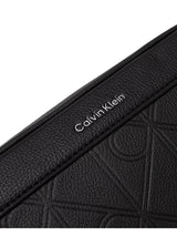 Calvin Klein · Чанта · XL EMBLEM AOP EMBO?SS POUCH W/ H | DontMiss.bg