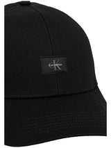 Calvin Klein · Шапка с козирка · MONOLOGO WOVEN PATCH TRUCKER | DontMiss.bg