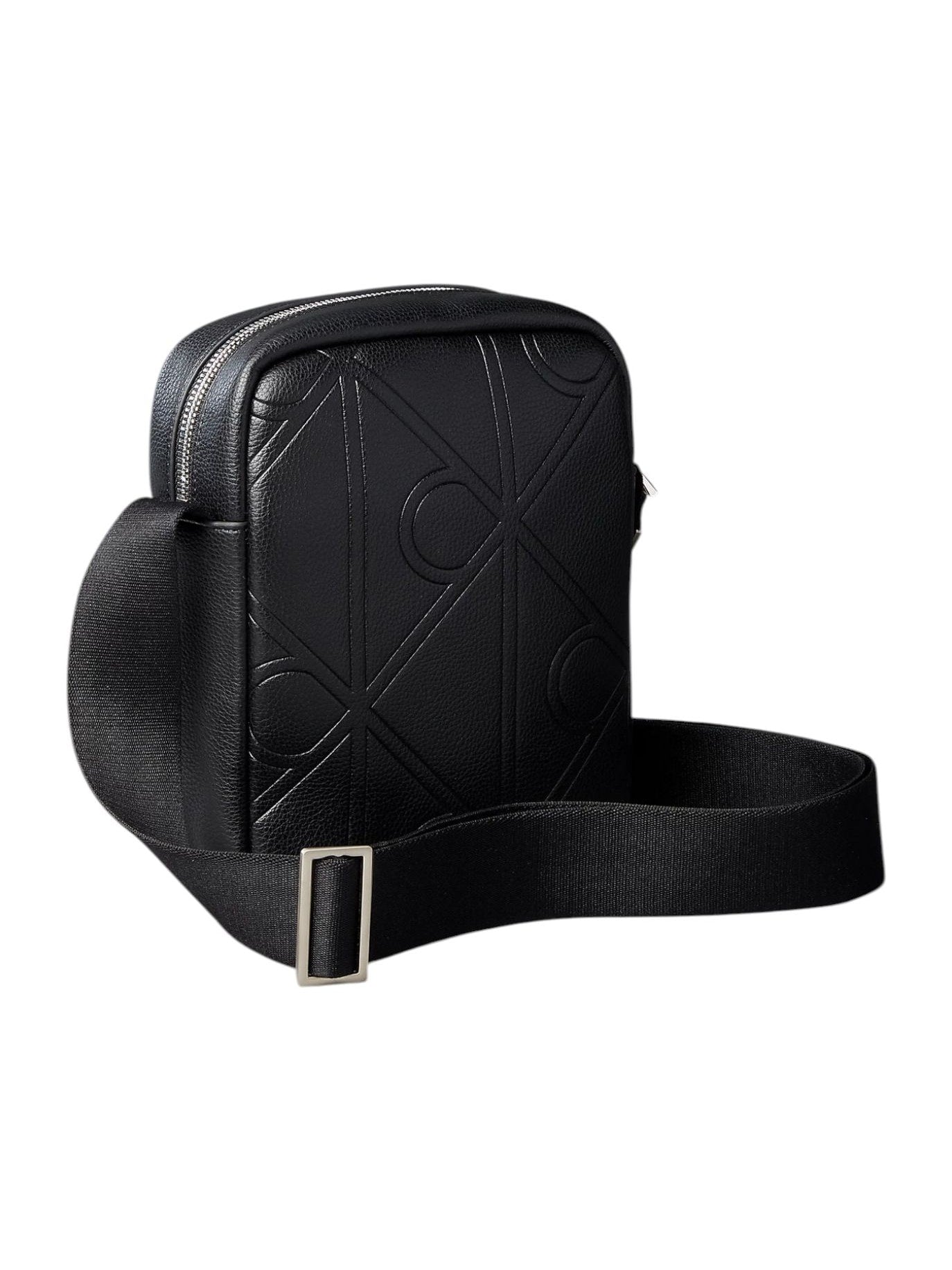 Calvin Klein · Чанта · EMBLEM AOP EMBOSS REPORTER | DontMiss.bg