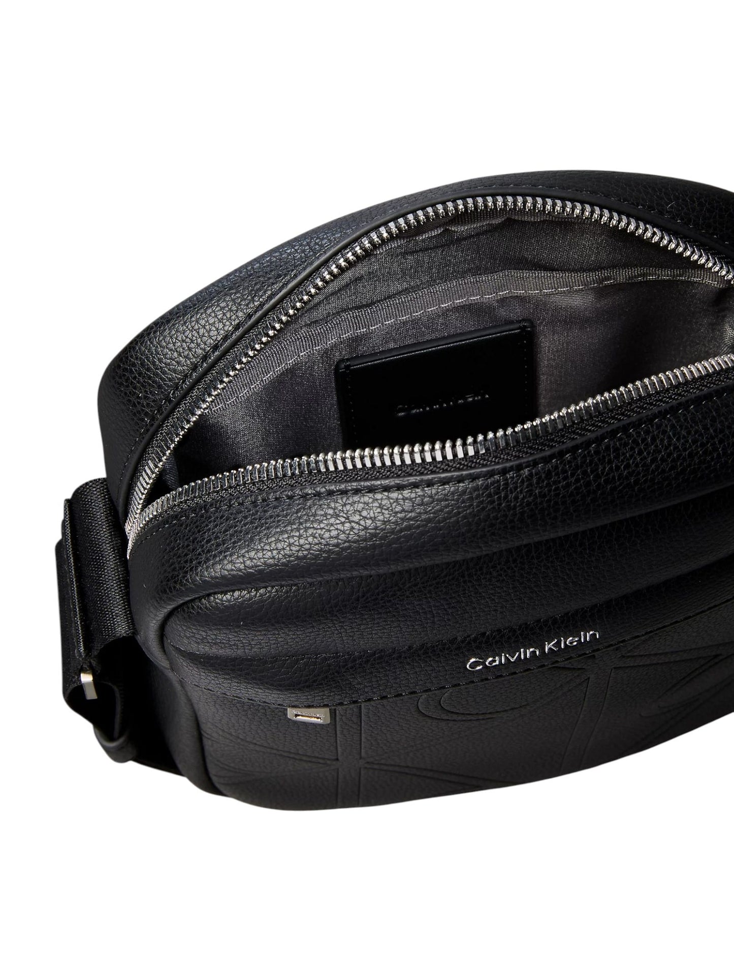 Calvin Klein · Чанта · EMBLEM AOP EMBOSS REPORTER | DontMiss.bg